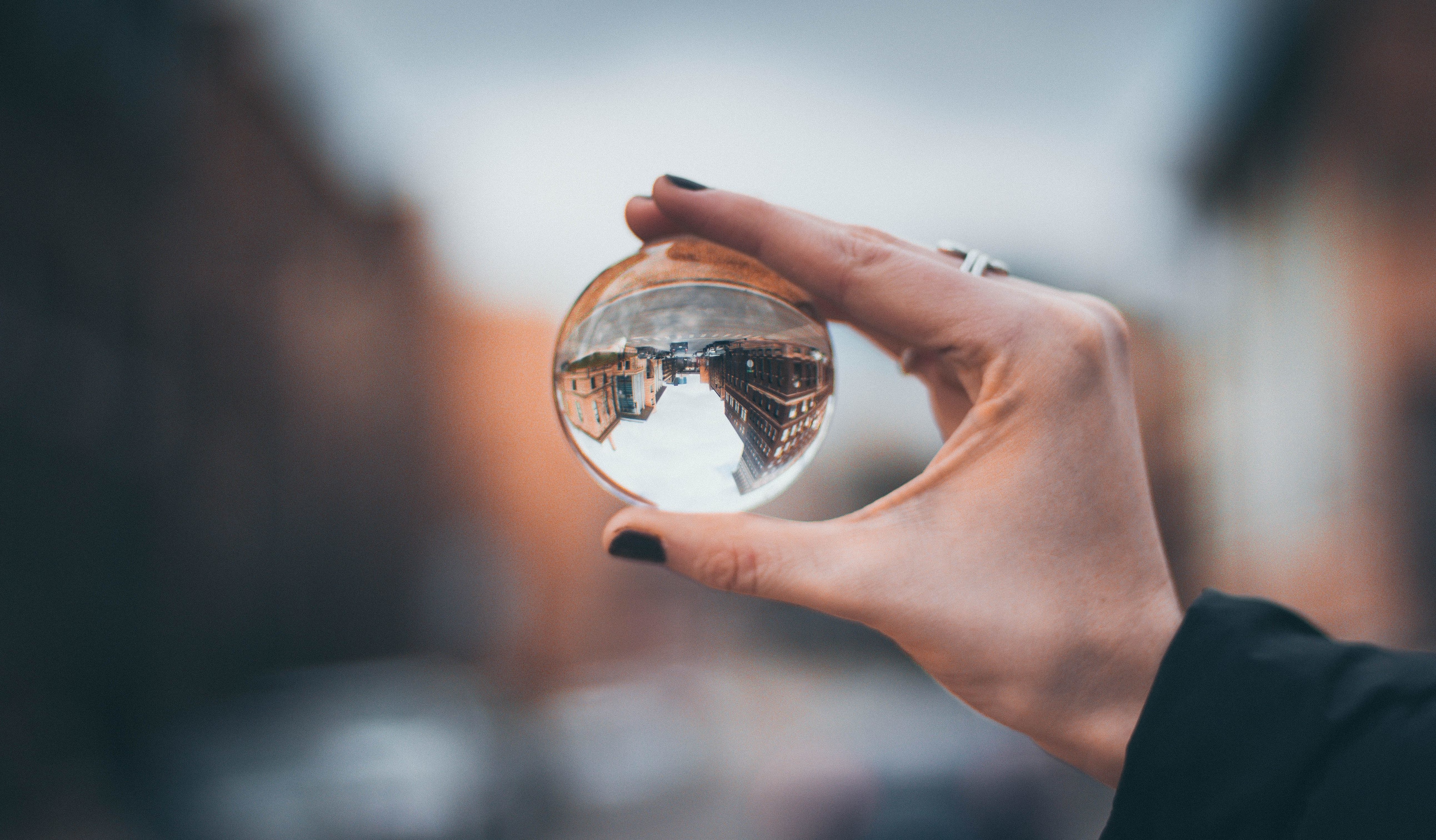 woman with glass orb